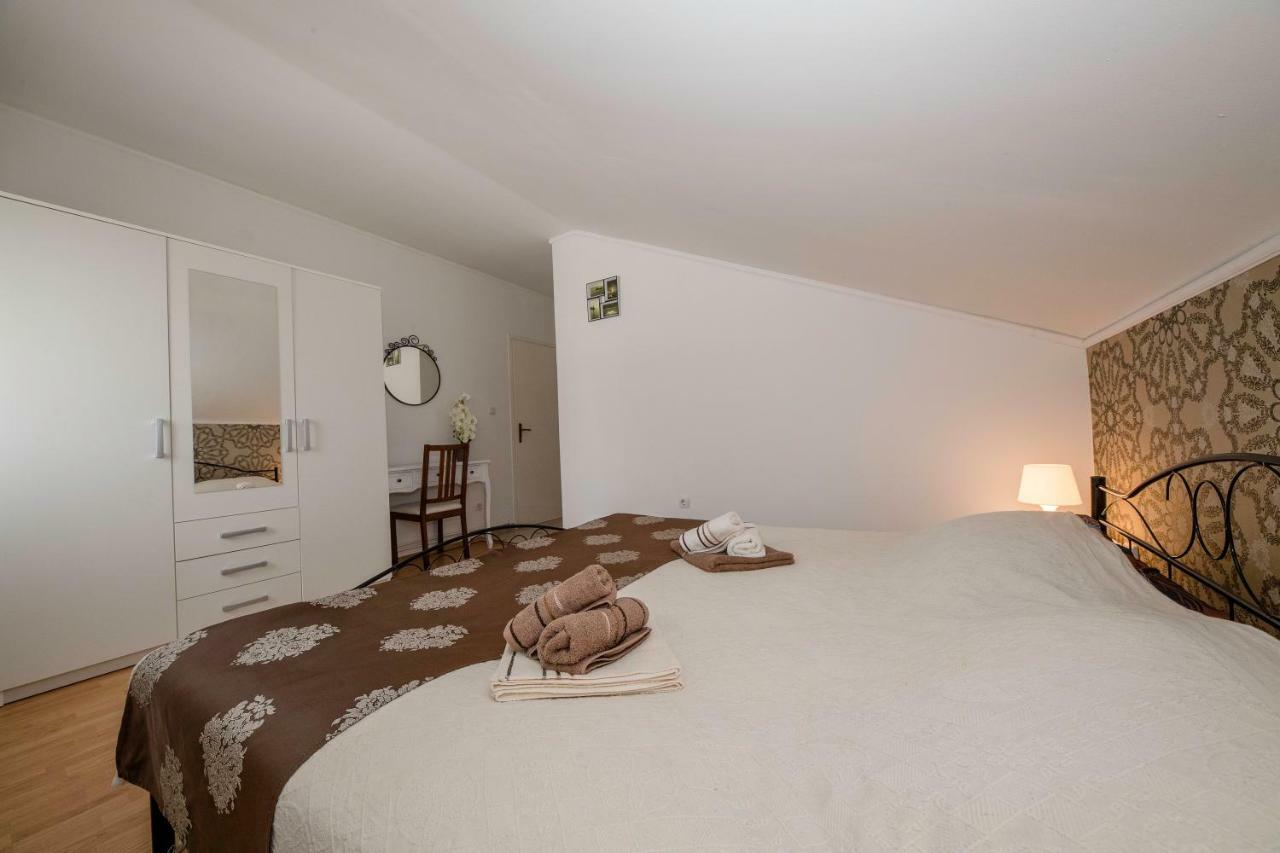 Apartmani Godinic Palit Esterno foto