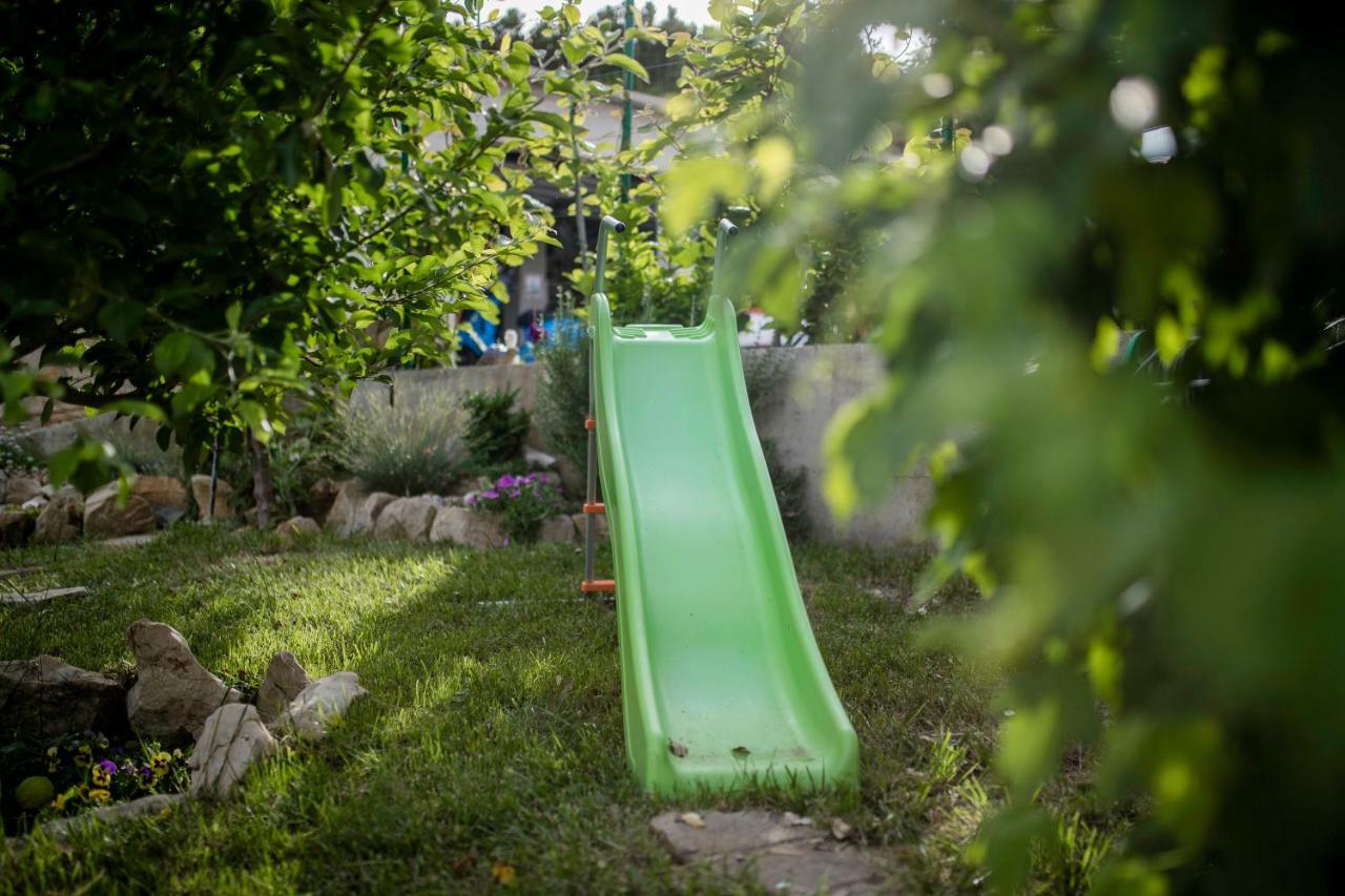Apartmani Godinic Palit Esterno foto
